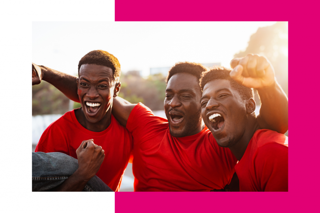 3 football players celebrate a goal at the Africa Cup of Nations