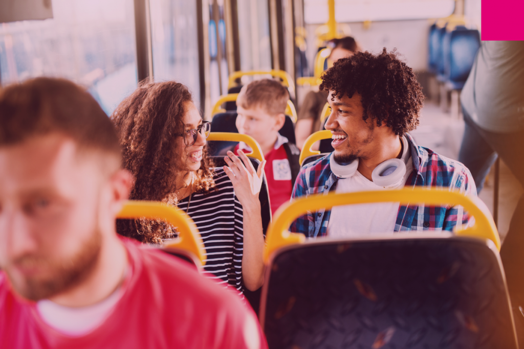 People talking in a bus to illustrate how mobility looks in 2024