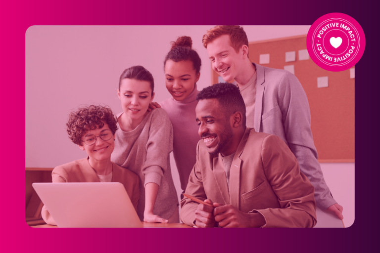 People looking at a computer to showcase diversity at work